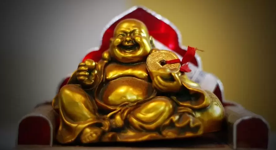 Buddha che ride con il portafortuna